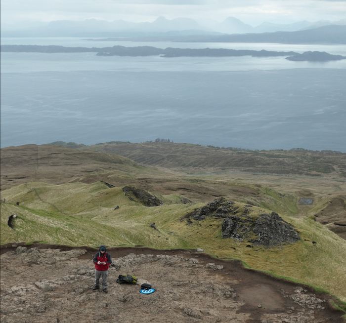 Tim on a hilltop overlooking the coast